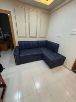 Modern L-Shape Sofa Cum Bed in Texture Blue Fabric - Image 2