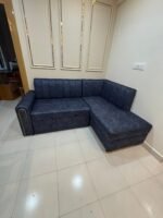 Modern L-Shape Sofa Cum Bed in Texture Blue Fabric